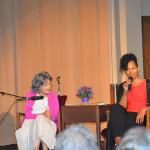 97-year-old yoga master Tao Porchon-Lynch and Teresa Kay-Aba Kennedy leading The Gandhi Effect workshop in Kansas City